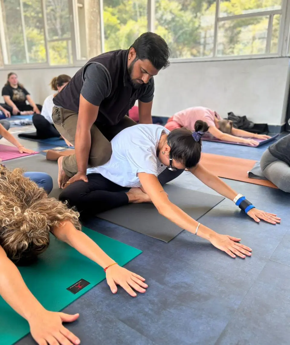 Student performing advanced asana during intensive yoga retreats in Rishikesh Himalayas